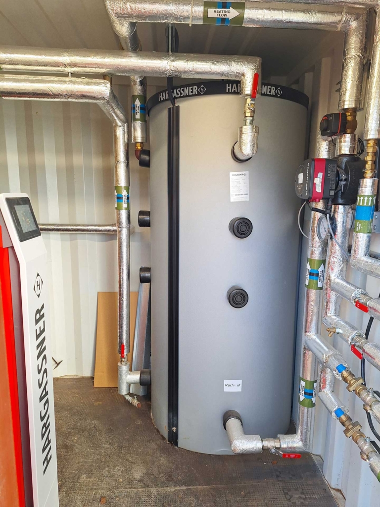Internal view heating container of Oxfordshire garden centre, United Kingdom | Reference Hargassner wood chip boiler